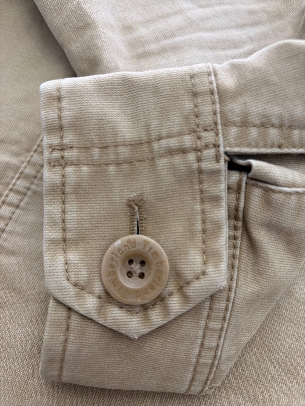 Timberland men’s military/field-style jacket in tan/khaki, size Small.
